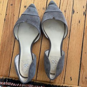 Grey suede flats.